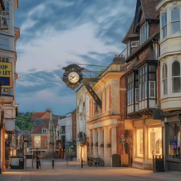 Winchester City centre High Street at night during mid-summer